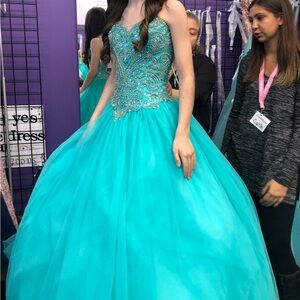 Never worn ballgown/quincenera , prom dress/ pageant gown. beading is exquisite!